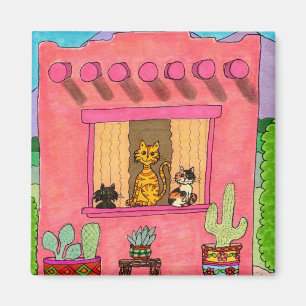 Imán Tres gatos en una casa de Adobe rosada