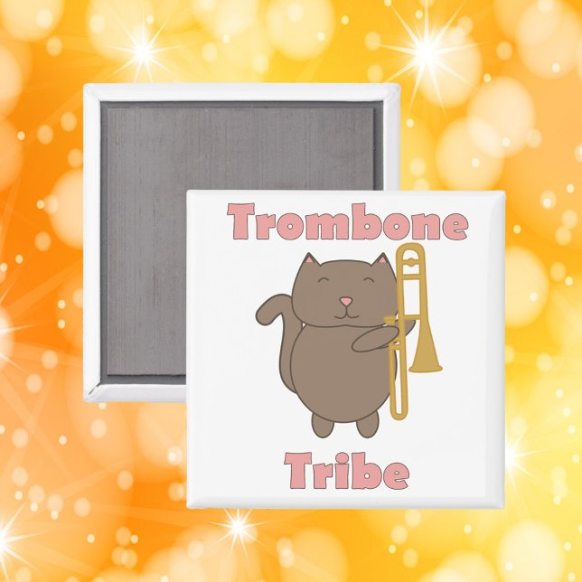 Imán Trombone Tribe Funny Cat Pink Letters (A magnet with a funny cat holding a trombone and the words trombone tribe in pink letters.)