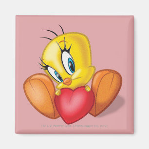 Imán Tweety sosteniendo un corazón