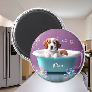 Imán Un cachorro lindo en una bañera con jabón