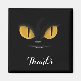 Imán Un gato negro malicioso con fangos gracias