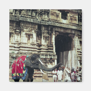 Imán Un hombre que es bendecido por un elefante