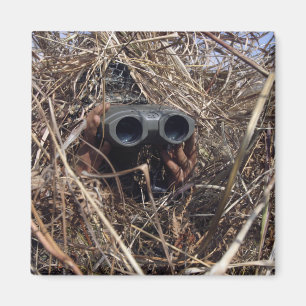 Imán Un observador del explorador practica el techniqu