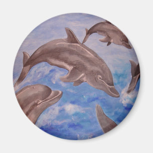 Imán Un pote de delfines juguetones