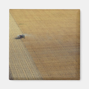 Imán Una cosecha del tractor