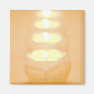 Imán Una fila de velas encendidas