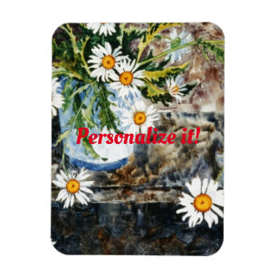 Imán Una olla blanca y azul de margaritas en una estant