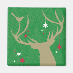 Imán Una silueta de ciervo con estrellas colgando de su