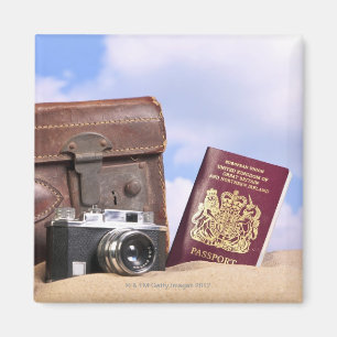 Imán Una vieja maleta de cuero, una cámara retro y