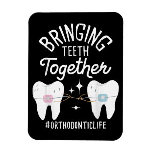 Imán Uniendo Dientes - Ortodoncista 