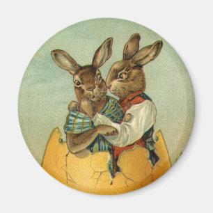 Imán Vintage conejillos victorianos de Pascua con huevo