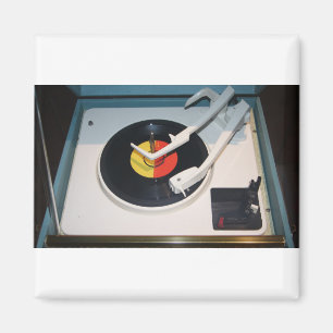 Imán Vinyl record and vintage record player turntable