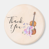 Violín, zapatos de ballet, flores y mariposas