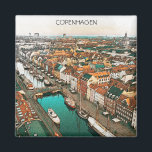 Imán Vista de ciudad de Dinamarca en Copenhague<br><div class="desc">Magnate de viajes colorido que muestra una vista panorámica sobre la capital española Copenhague con su arquitectura asombrosa. Gran idea de viaje en Dinamarca para todos los turistas.</div>