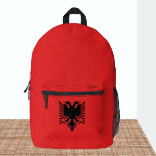 Impresa Albania, mochila roja, bandera albanesa