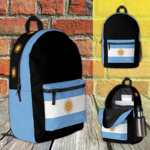Impresa Argentina, mochila negra, bandera argentina/patrió