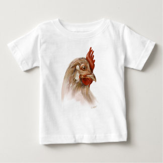 Impresión del gallo en la camiseta del bebé