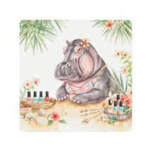 Hippo is doing manicure by the beach 