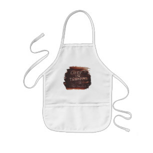 Infantil cocinero en delantal del entrenamiento
