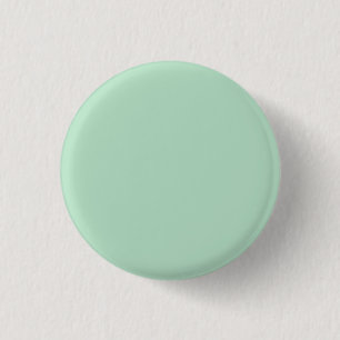 Insignia de botón verde de la Fábrica de la Moneda
