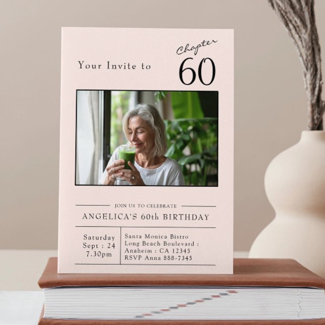 Invitación 60° cumpleaños foto de Rubor Pink 60 (60th birthday blush pink party invitation stood on a book.)