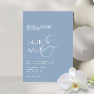Invitación a la boda con escritura azul y crema
