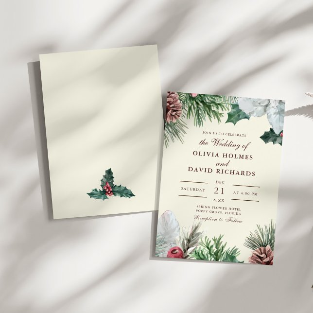 Invitación a la boda de invierno sobre la vegetaci (Winter Greenery Wedding Invitation on a sunny white table.)