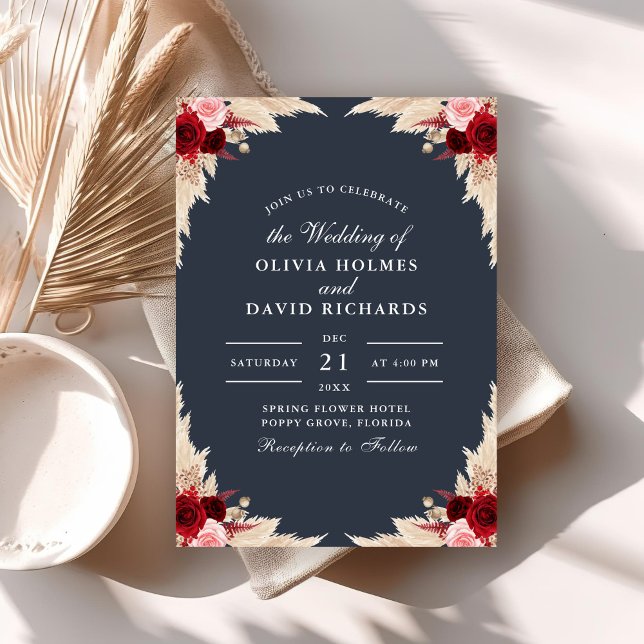 Invitación a la boda de Rosas tropicales azules de (Midnight Blue Tropical Roses Wedding Invitation on a boho table with dry palm leaf.)