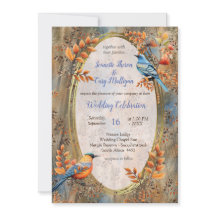 Árboles altos, hojas otoñales y aves azules.