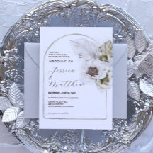 Boda de flores y plumas blancas