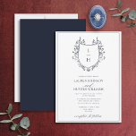Invitación Boda de Monograma de Flor Silvestre Azul Clásico<br><div class="desc">¿Estás buscando un giro moderno en una invitación clásica a la boda? Entonces no hay más que ver nuestra clásica invitación a la boda Escudo Monograma de la Marina Azul Flora Silvestre! Esta bonita invitación está diseñada con un escudo de dibujos a mano adornado con flores silvestres y mariposas. Presenta...</div>