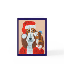Cachorro Basset contándole a Santa sus deseos de N