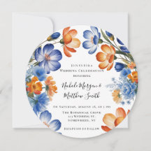 Celebración de boda floral azul cobalto y naranja