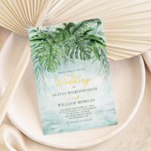 Boda elegante con follaje tropical y lámina de oro
