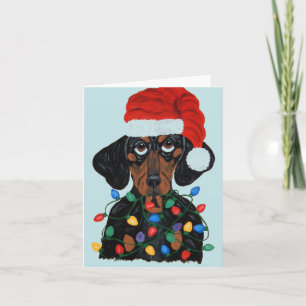 Invitación Dachshund Santa enredado en luces de Navidad