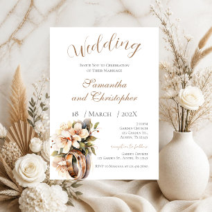 invitación de boda con anillos y flores blancas