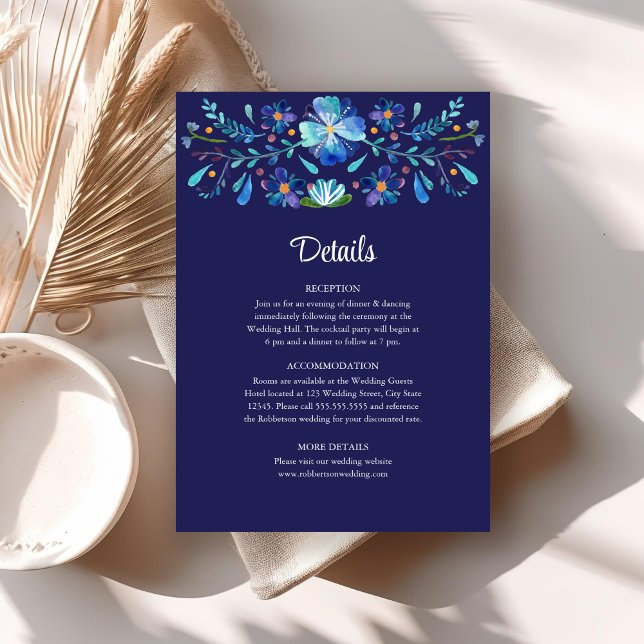 Invitación Detalles del Boda de Fiesta Floral Mexicana Azul d (Navy Blue Mexican Floral Fiesta Wedding Details Invitation on a neutral boho table.)