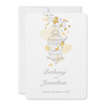 Dos pájaros amarillos boda de jaulas abiertas