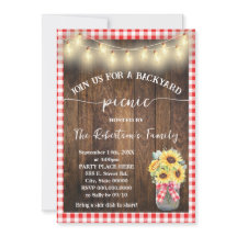 Fiesta de picnic en el patio trasero con girasoles