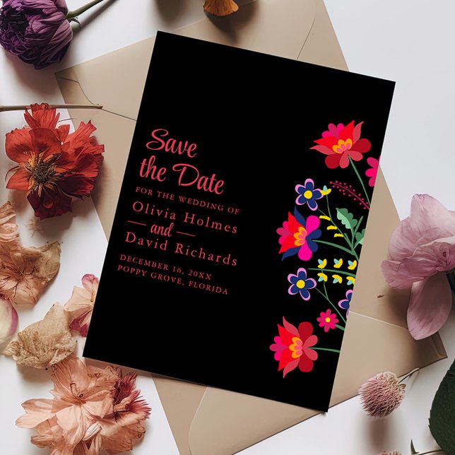 Invitación Fiesta floral mexicana negra salva la carta de fec (Black Mexican Floral Fiesta Save the Date Card on a table with colorful flowers.)