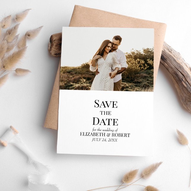 Invitación Foto de Personalizado blanco y negro Guardar tarje (Black and White Custom Photo Save the Date Card on a table with neutral boho decor)