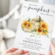 Gemelos de calabazas blancas giratorias caen en Ba