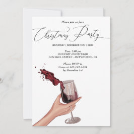 Invitación mano con fiesta de navidades de vino tinto