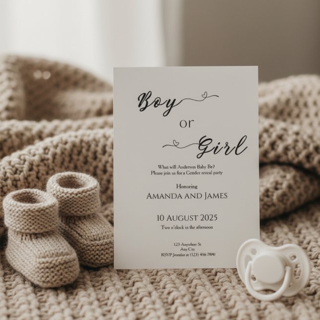 Invitación Minimalist Boy or Girl Gender Reveal (Gender reveal invitation on beige knit blanket with baby booties and pacifier in warm light)