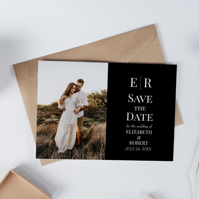 Invitación Personalizado de Monograma Negro Foto Guardar tarj (Black Monogram Custom Photo Save the Date Card on white table with neutral decoration.)