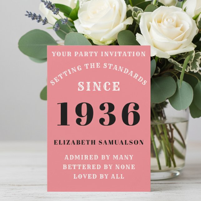 Invitación Personalized 90th Birthday 1936 Add Your Name Pink (Born 1936 Pink Party invite on a table with flowers. )