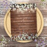 Invitación Rustic Wood String Lights Sage Lilac Boda<br><div class="desc">Una elegante invitación a la boda rústica con luces de cuerda de bonito y hojas de salvia y lila que caen sobre un fondo rústico de paneles de madera con los detalles bodas enmarcados en un elegante texto clásico. Diseñado por Thisisnotme©</div>