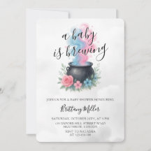 Un bebé está preparando caldero rosa y azul