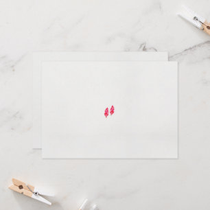 Invitación un par de hojas rojas sobre un fondo negro