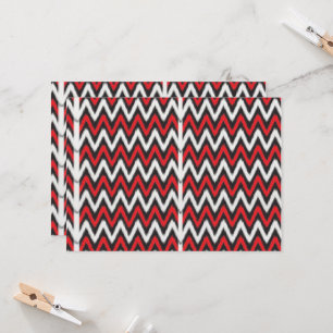 Invitación un patrón de zigzag rojo y negro en un grupo de fo